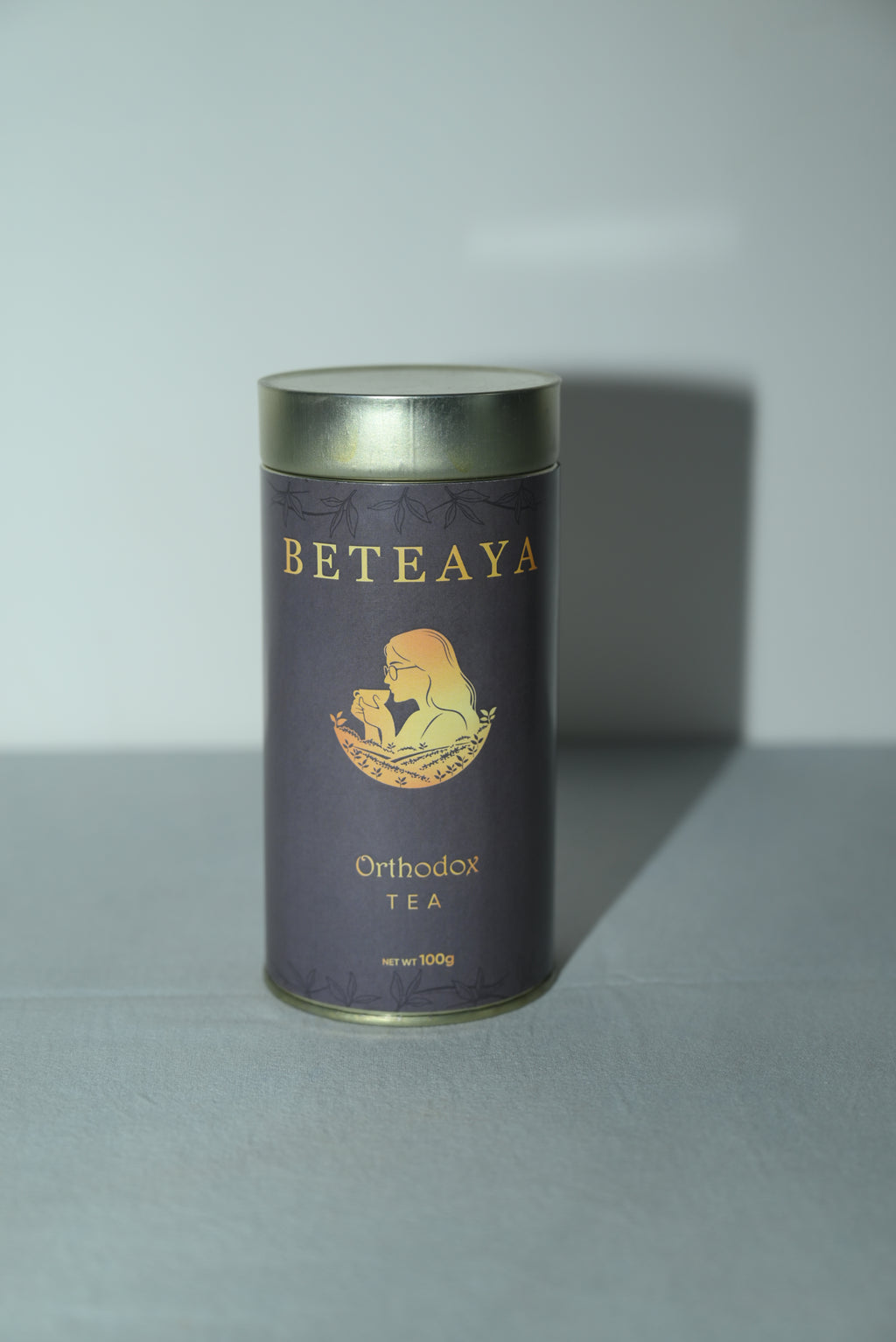 Tea canister with 'Beteaya' branding on a light gray background