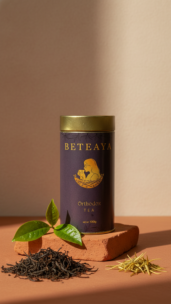 Beteaya tea canister with tea leaves and dry tea on a beige background